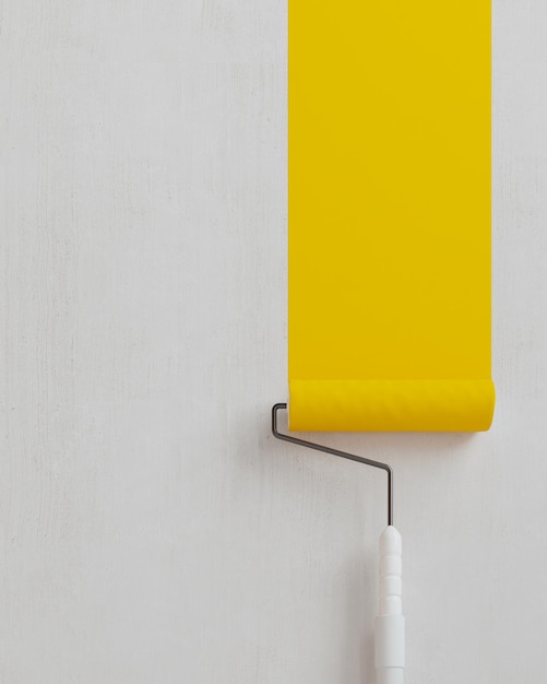 Foto pintar una pared vacía en amarillo con un rodillo de pintura concepto para publicidad en color