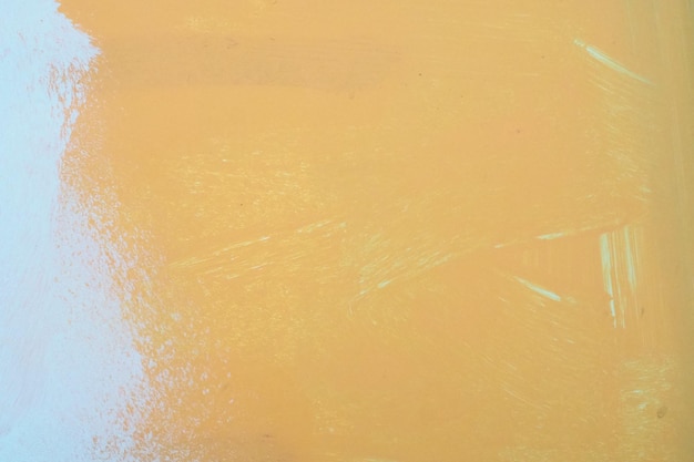 Pintura al óleo blanca naranja sobre textura de pintura al óleo de pared enyesada con trazos de pincel y espátula m