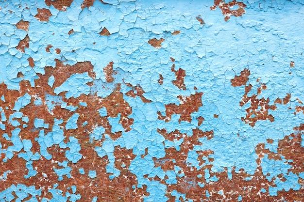 Pintura azul pelada Viejo patrón de pintura agrietada sobre fondo oxidado Patrón de material grunge