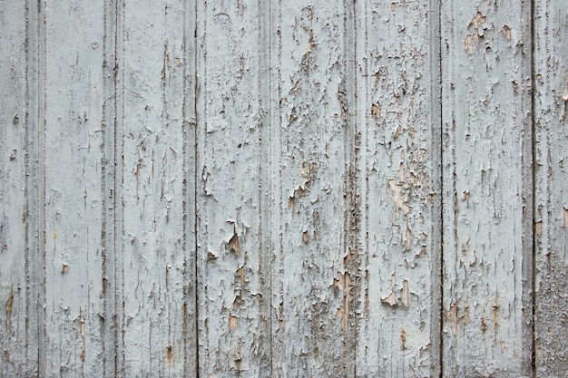 Foto pintura ligera desprendida de la superficie de madera