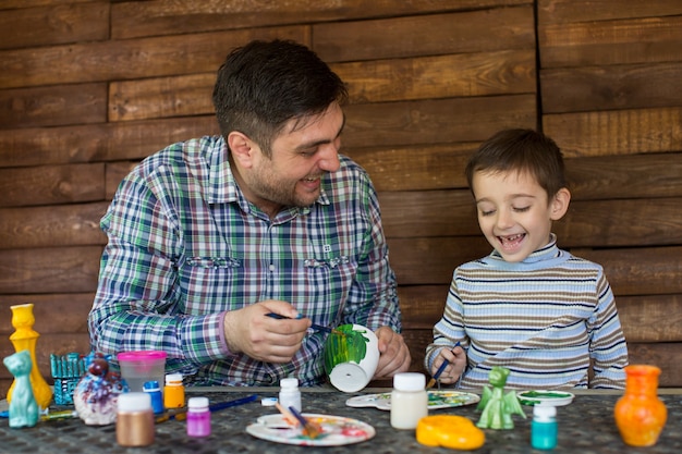 Pintura de padre e hijo.