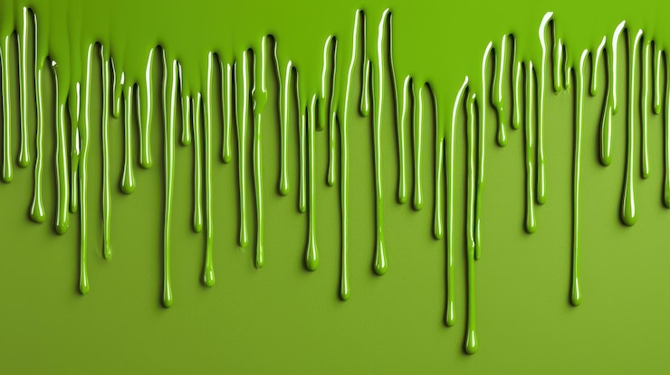 Foto pintura verde a escorrer sobre um fundo verde