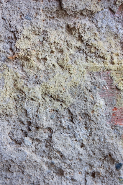 Foto pintura vieja azul desconchada en un muro de hormigón textura de pared vieja