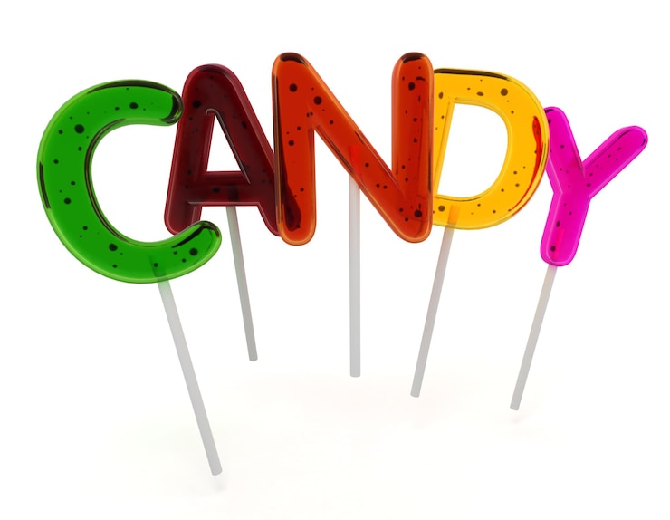 Foto piruletas de colores que forman la palabra caramelo