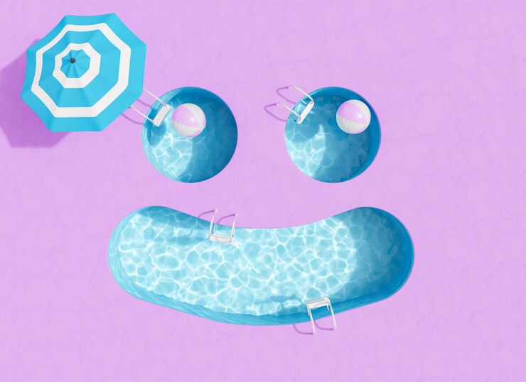 Piscinas con sombrilla creando cara sonriente