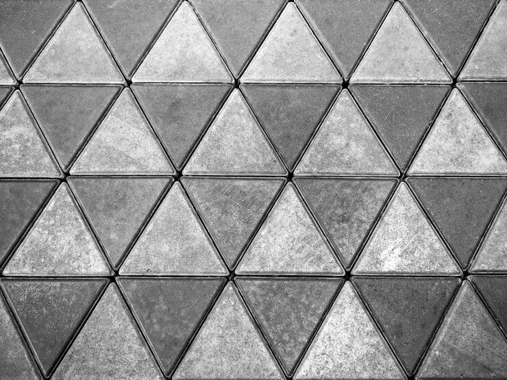 Foto piso de hormigón gris, triángulo de fondo.