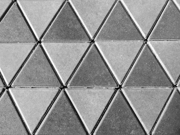 Foto piso de hormigón gris, triángulo de fondo.