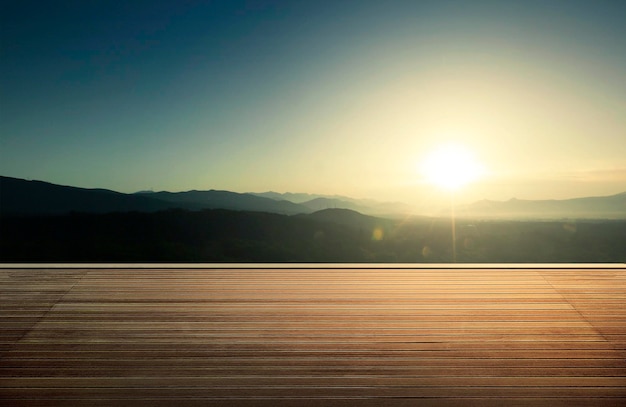 Foto piso con textura de madera con fondo de montaña de bosque natural durante el amanecer