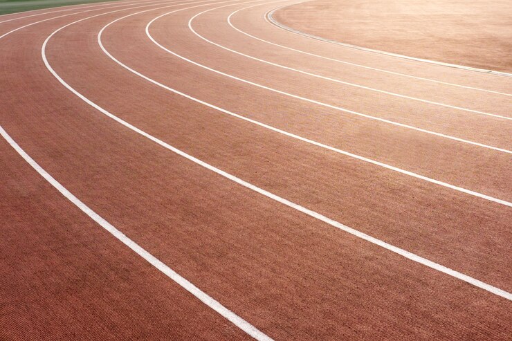 Pista de correr roja en el estadio