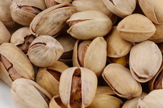 Pistácios são nozes deliciosas. Muitas nozes saudáveis para comer