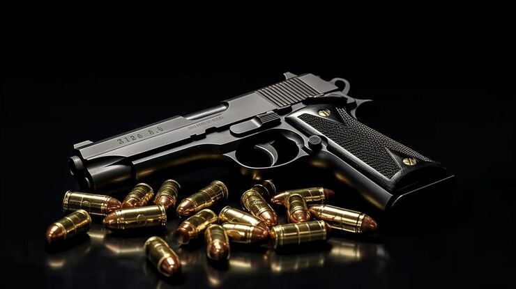 Pistola y balas sobre un fondo negro El concepto de crimen generativo ai