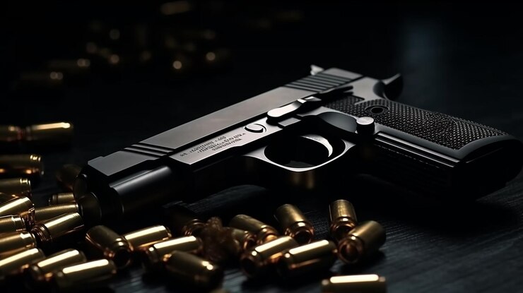 Pistola y balas sobre un fondo negro El concepto de crimen generativo ai