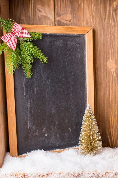 Pizarra de fondo navideño con decoración festiva