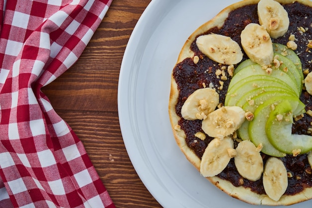 Pizza con chocolate y plátano