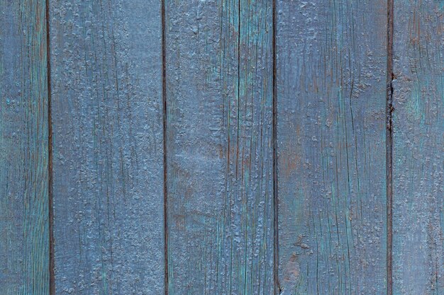 Placa azul del antiguo granero Pintura azul texturizada y descascarada del antiguo edificio de la granja Textura de fondo