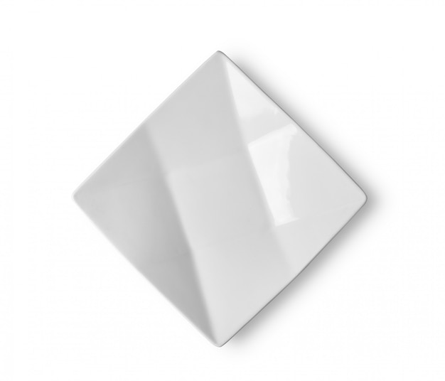 Placa de cerámica blanca vacía sobre superficie blanca