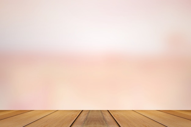 Placa de madeira com fundo de luzes de tom rosa abstrato. Fundo borrado rosa.
