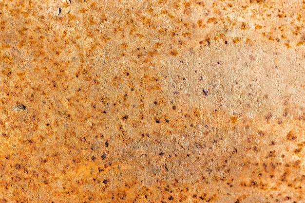 Placa metálica oxidada marrón claro como fondo