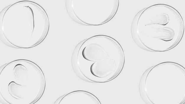 Placas de Petri sobre un fondo claro manchas de gel transparente Espacio publicitario vacío