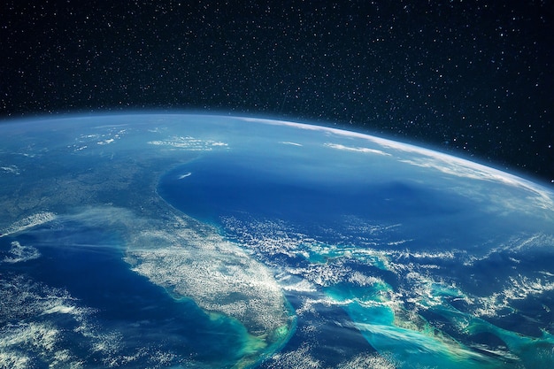 Planeta tierra azul con océanos y continentes en espacio abierto en el cielo estrellado