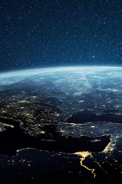 Planeta tierra desde el espacio por la noche.