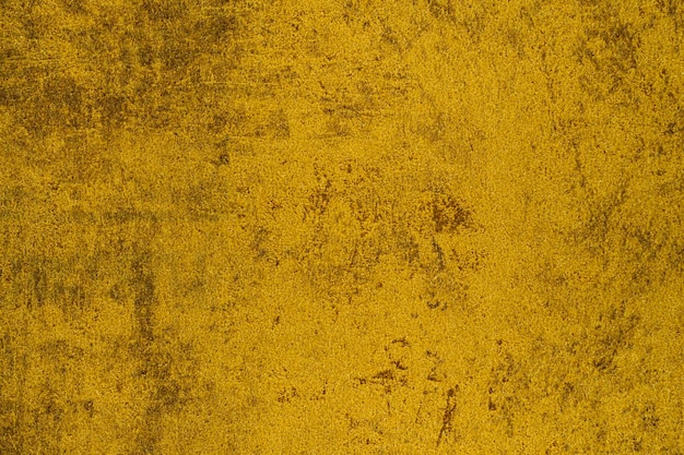 Plano de fundo da textura da superfície do grunge riscado pintado de amarelo.