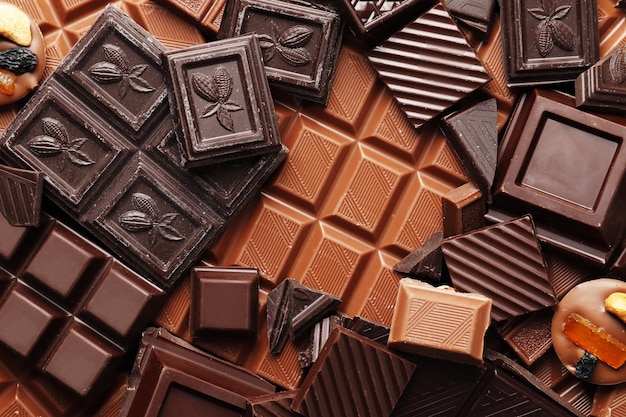 Plano de fundo de muitos pedaços diferentes de chocolate