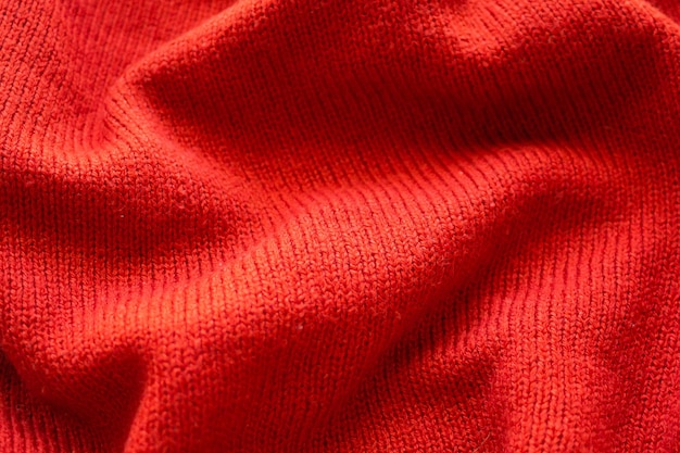 Plano de fundo de textura de tecido de lã de malha vermelha de close up