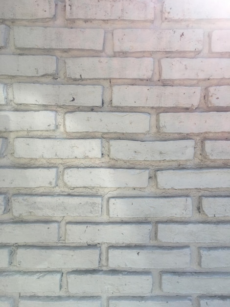 Plano de fundo de uma parede de tijolos expostos