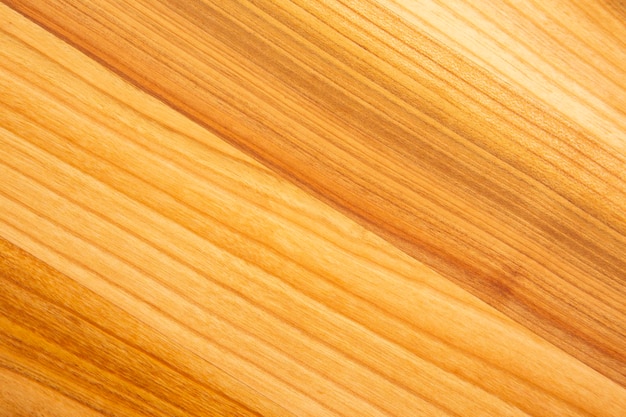 Plano de fundo e textura de close-up de madeira tratada lisa na diagonal.