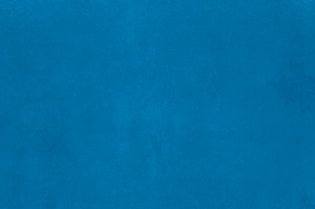 Plano de fundo texturizado de parede de concreto pintado de azul