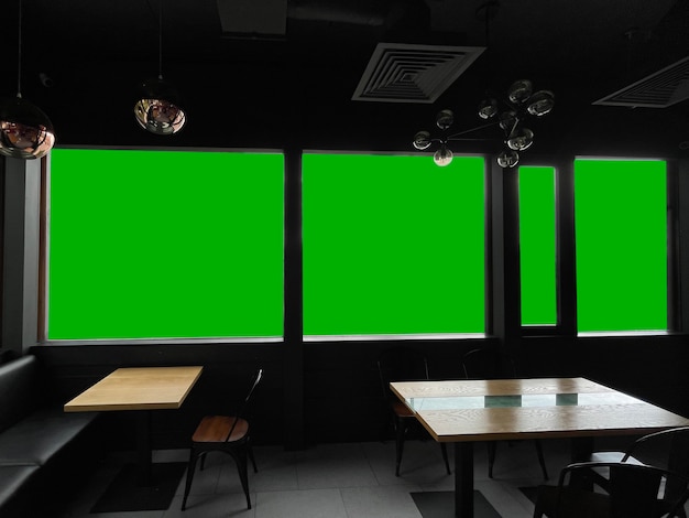 Una plantilla de maqueta de espacio de copia con una ventana que mira hacia afuera, pantalla verde chromakey