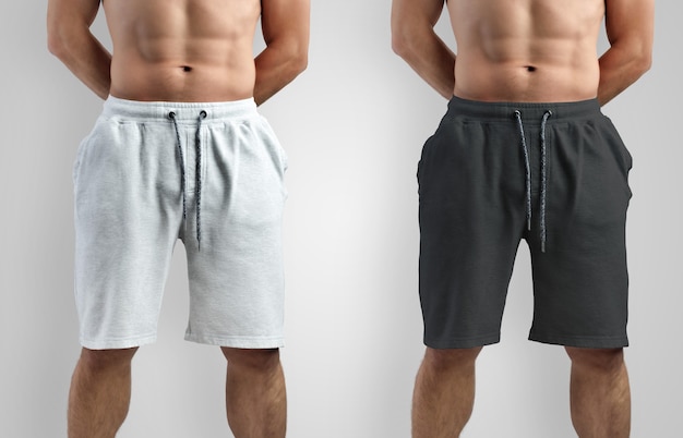 Plantilla de shorts de maqueta en blanco y negro para presentación en la tienda. Diseño de moda para hombres en una vista frontal de fondo aislado