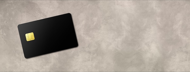 Plantilla de tarjeta de crédito negra en un banner de fondo de hormigón. Ilustración 3D
