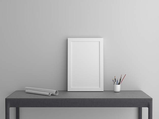 Plantillas de cuadros en blanco en la mesa en la sala de estar