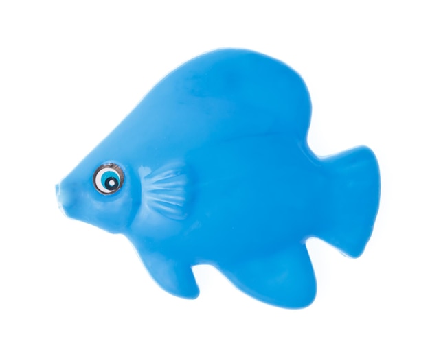 Plastikspielzeug-Tierfisch lokalisiert auf weißem Hintergrund