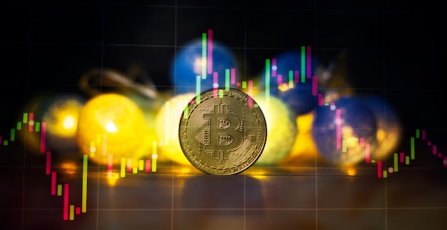 Plataforma de investimento com gráficos e moeda bitcoin. moedas de criptomoeda bitcoin btc. conceito de mercado de ações.