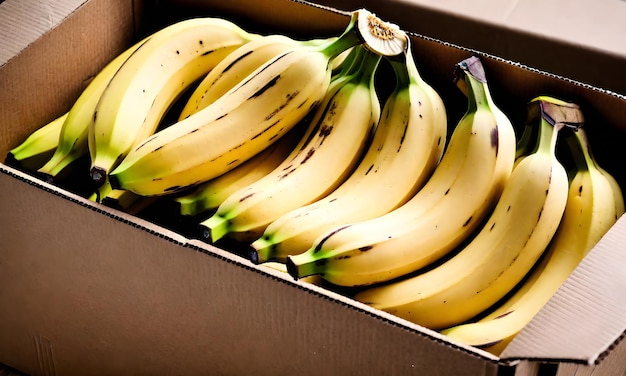 Foto plátanos amarillos en una caja de cartón