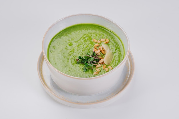 Plato de sopa de crema de espinacas y verduras Cerrar