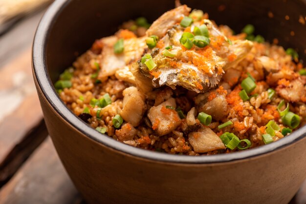 Platos de banquete chino tradicional, arroz guisado de corvina amarilla