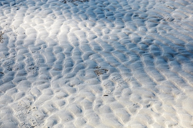 Playa de arena en el mar con fondo de textura