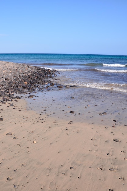 La playa de arena del océano