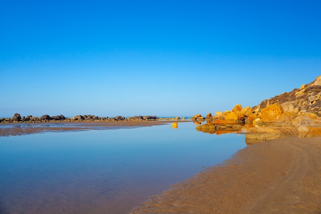 Foto playa de capo rosselló en realmonte, agrigento. sicilia