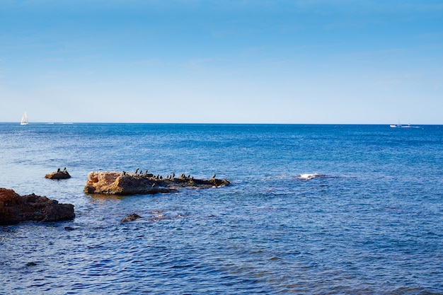 Playa de Denia Las Rotas en verano en Alicante.