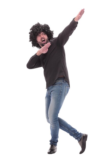 Foto en pleno crecimiento gracioso bailarín chico aislado en blanco