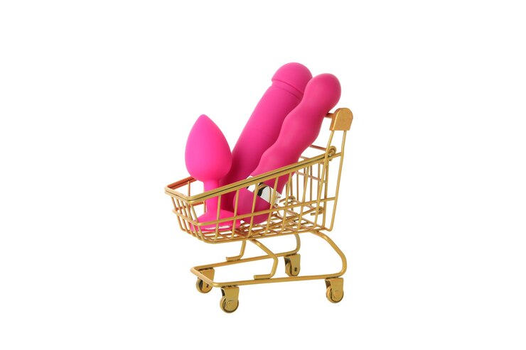 PNG rosa juguetes sexuales en cesta aislado sobre fondo blanco.