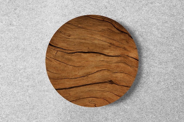 Podium de pedestal de cilindro de madera para la exhibición de productos sobre un fondo realista de cemento y mármol