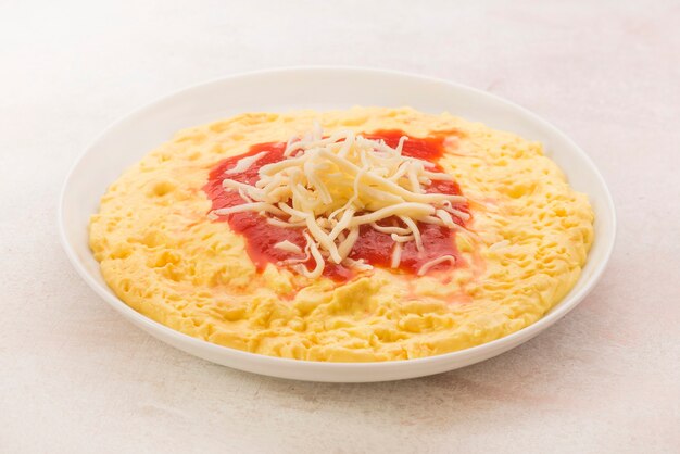 Polenta con tomate queso y picadillo