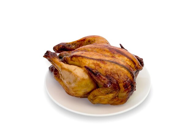 Foto pollo asado aislado en el camino de recorte de fondo blanco