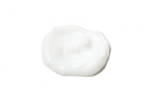 Ponto de creme isolado no fundo branco. Cosméticos. Higiene